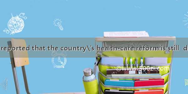 35. It has been reported that the country\'s health-care reform is still  debate.A. inB. on