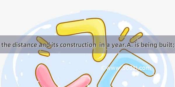 A bridge  in the distance and its construction  in a year.A. is being built; will be finis