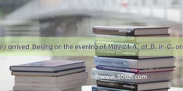 They arrived  Beijing on the evening of May 24.A. at  B. in  C. on