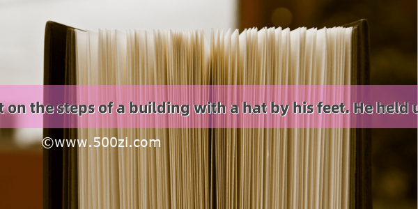 A blind boy sat on the steps of a building with a hat by his feet. He held up a sign which